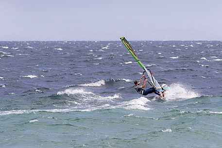 Porto Pollo, a dream destination for windsurfing, expecially in windy days during summer, Sardinia, Italy Porto Pollo, a dream destination for windsurfing, expecially in windy days during summer, Sardinia, Italy