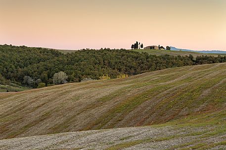 Madonna of Vitaleta Chapel, one of the most photographed churches in Tuscany, is a mystical building to be the home of a Renaissance statue of the Madonna sculpted by the artist Andrea della Robbia in 1590, Orcia valley, Tuscany