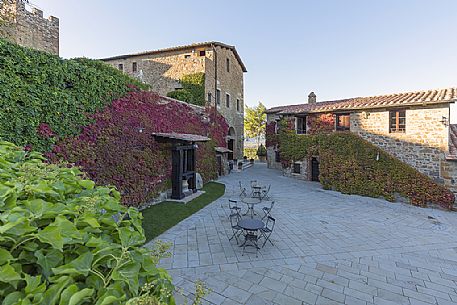 Poggio alle Mura Castle, called Banfi Castle extends to the south of Montalcino, to the borders of the wonderful landscape of Val d’Orcia, dedicated to the production of the famous wines Rosso di Montalcino and Brunello di Montalcino, Tuscany Poggio alle Mura Castle, called Banfi Castle extends to the south of Montalcino, to the borders of the wonderful landscape of Val d’Orcia, dedicated to the production of the famous wines Rosso di Montalcino and Brunello di Montalcino, Tuscany