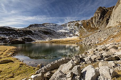 Avostanis Lake, dominated by Creta di Timau and Cima Avostanis mounts it is  one of the most fascinating places in Carnia, Friuli Venezia Giulia, Italy