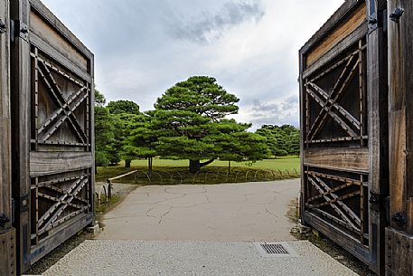 View to  Honmaru garden from a wide door inside Nijo Castle, one of the most well known sights in Kyoto, Japan
