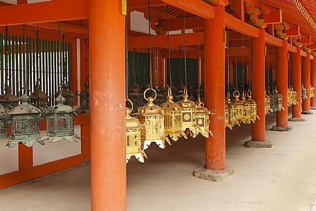 Hanging lanterns at the Kasuga Shrine in Nara, Japan. The interior of this Shrine is famous for its more 1000 bronze lanterns and it is a Unesco World Heritage Site