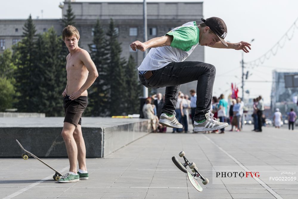 Young boys skateboarding in the central square of Novosibirsk, Russia