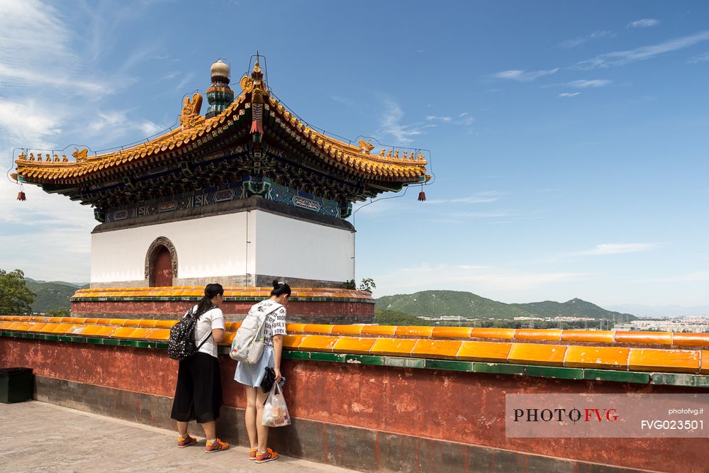 Two women visiting the Summer Palace in Beijing