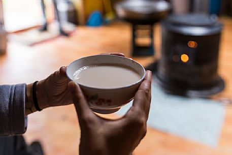 A cup of yak milk tea in a mongolian tent, Mongolia