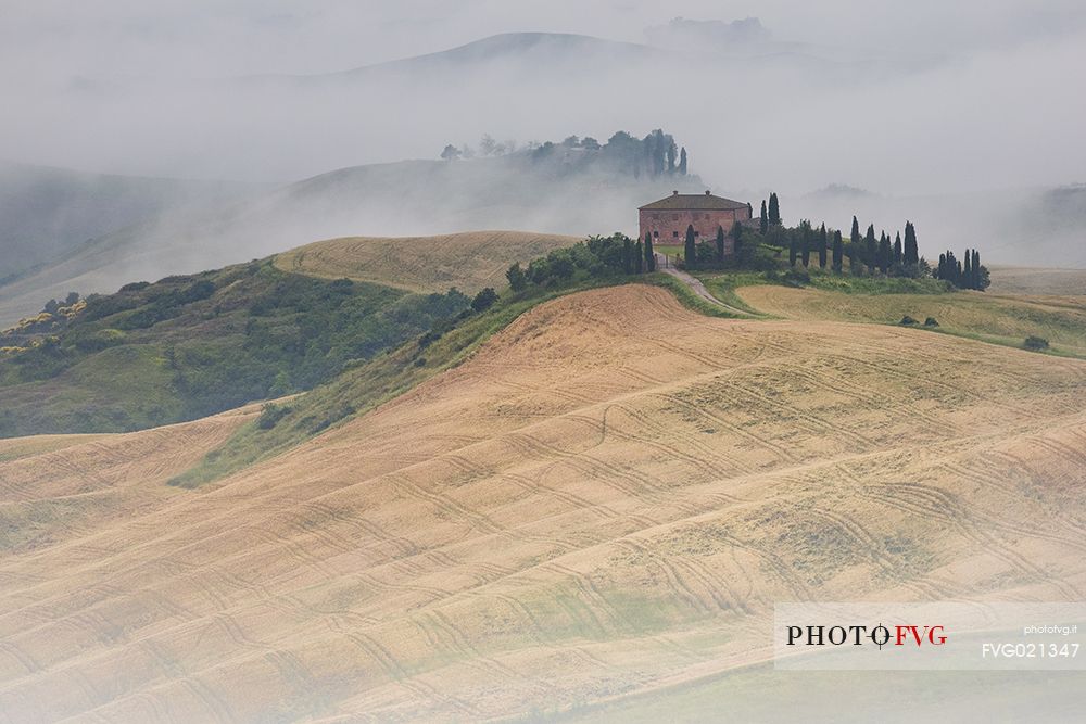 Fog in the Crete Senesi, Orcia valley, Tuscany, Italy