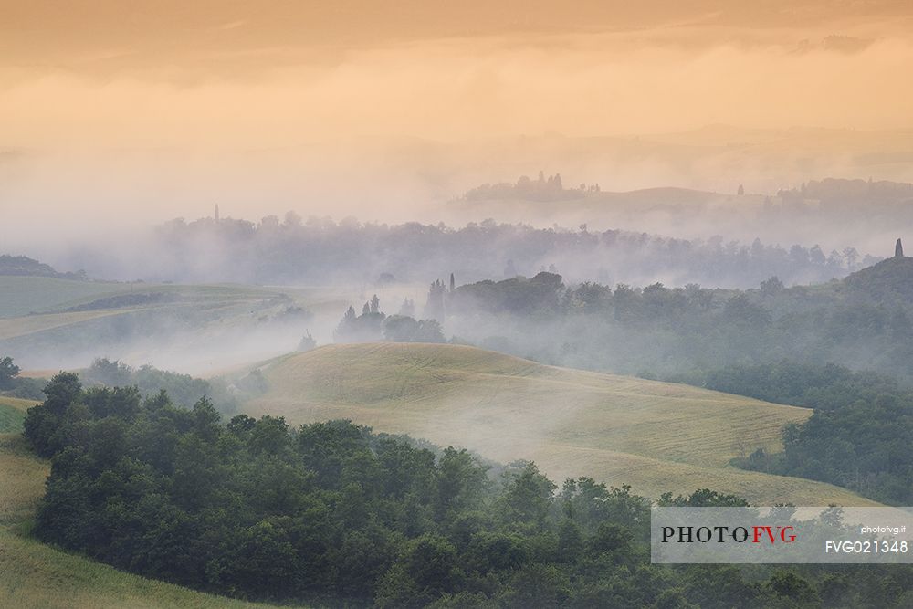 Crete Senesi in the fog, Orcia valley, Tuscany, Italy