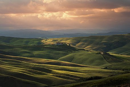 Sunset over the Crete Senesi landscape, Orcia valley, Tuscany, Italy