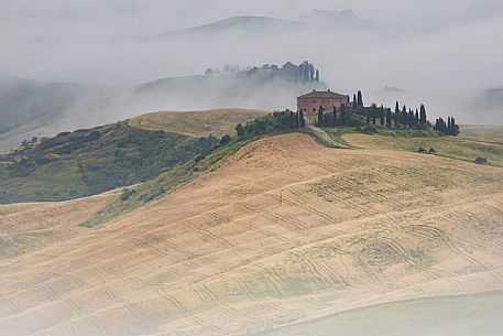 Fog in the Crete Senesi, Orcia valley, Tuscany, Italy