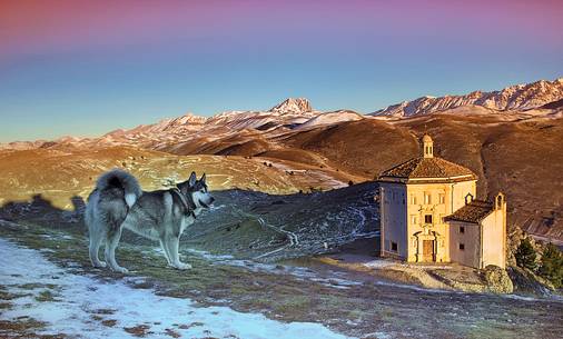 Church of St. Mary of mercy, Santa Maria della Pietà and Corno Grande mountain in background, Rocca Calscio, Gran Sasso national park, Abruzzo, Italy Church of St. Mary of mercy, Santa Maria della Pietà and Corno Grande mountain in background, Rocca Calscio, Gran Sasso national park, Abruzzo, Italy