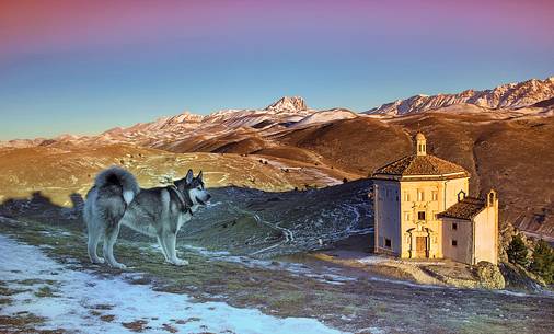 Church of St. Mary of mercy, Santa Maria della Piet and Corno Grande mountain in background, Rocca Calscio, Gran Sasso national park, Abruzzo, Italy