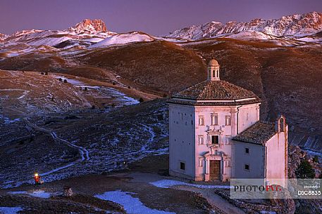 Church of St. Mary of mercy, Santa Maria della Piet and Corno Grande mountain in background, Rocca Calscio, Gran Sasso national park, Abruzzo, Italy