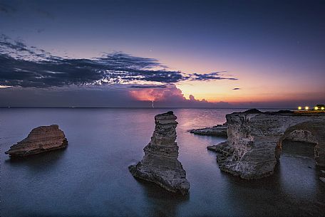 Sunrise on Torre Sant Andrea or St. Andrew's tower reefs, Salentine peninsula, Apulia, Italy