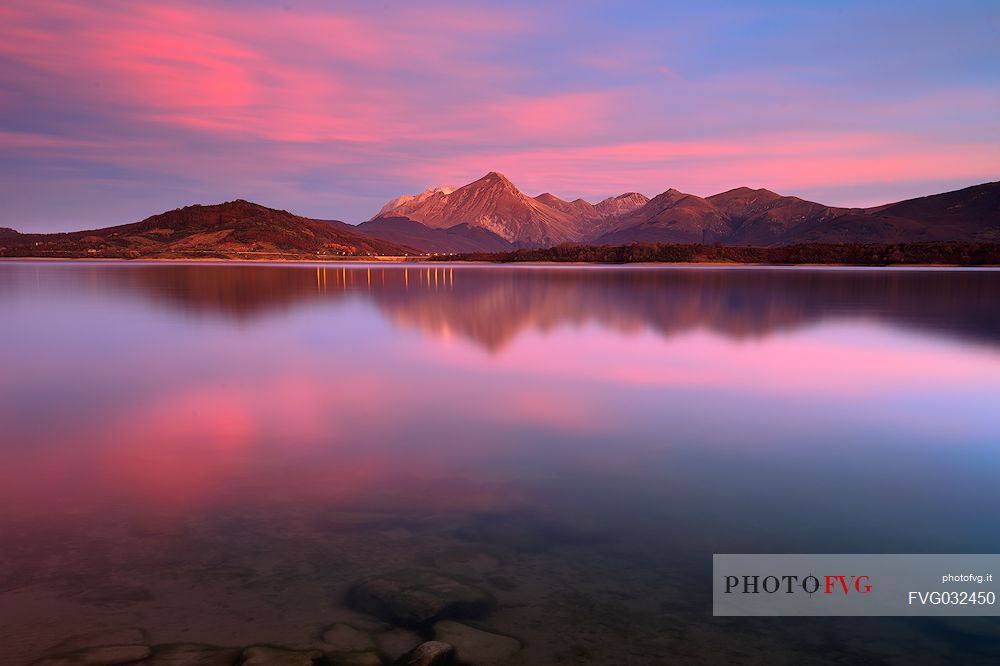 The lake of Campotosto at sunset, Gran Sasso e Monti della Laga national park, Abruzzo, Italy