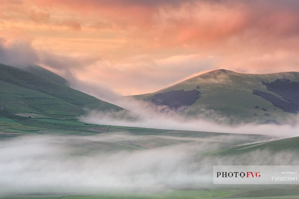 Foggy day wraps the Pian Grande of Castelluccio di Norcia, Sibillini national park, Umbria, Italy, Europe