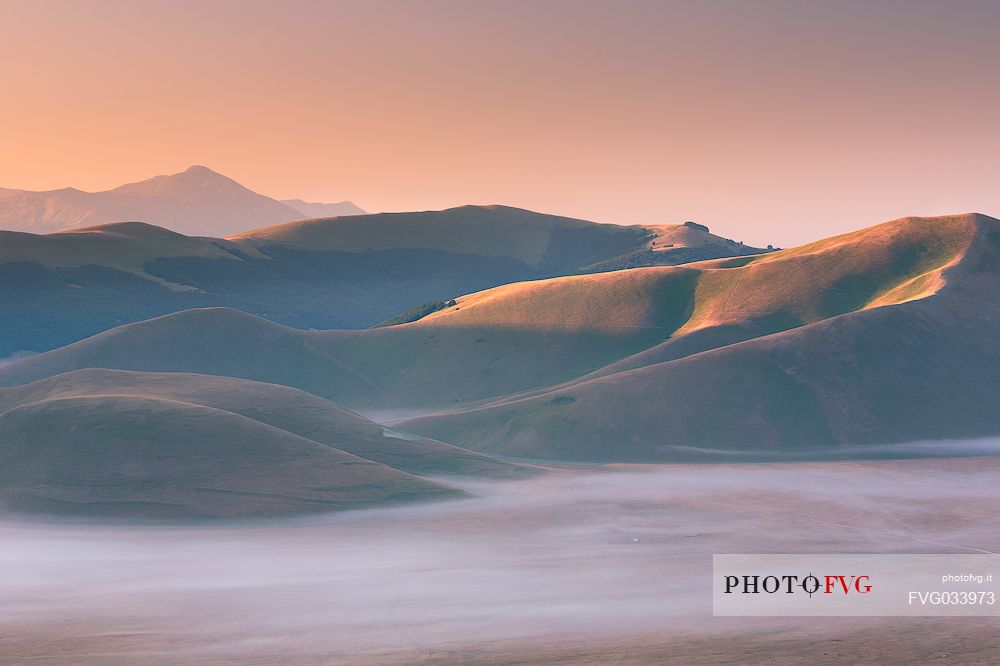 The fog on the plain of Castelluccio di Norcia, Sibillini National Park, Umbria, Italy, Europe