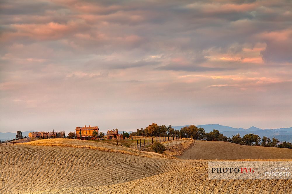 The beauty of the hills in Val d'Orcia, ridges and farmhouses typical of Tuscan beauties, Pienza, Tuscany, Italy, Europe