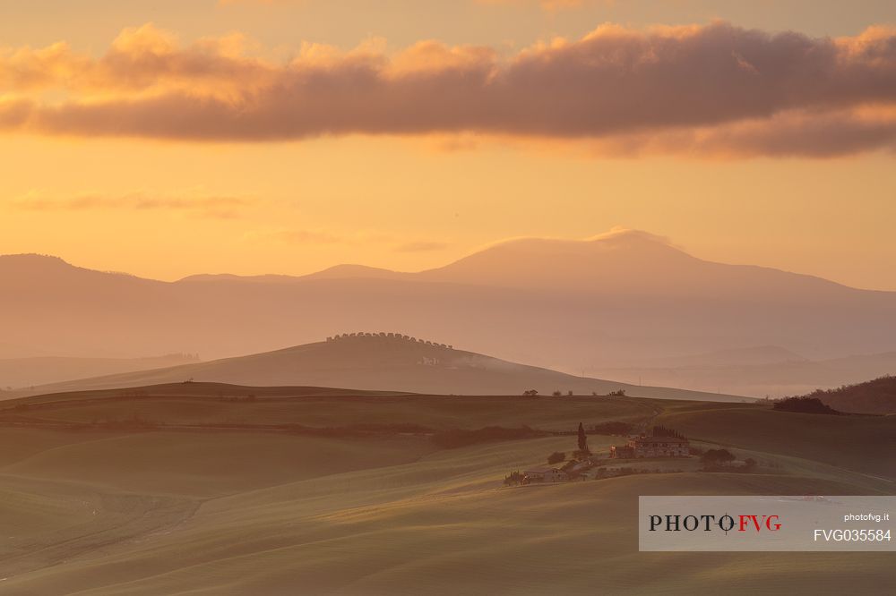 The beauty of the hills in Val d'Orcia, ridges and farmhouses typical of Tuscan beauties