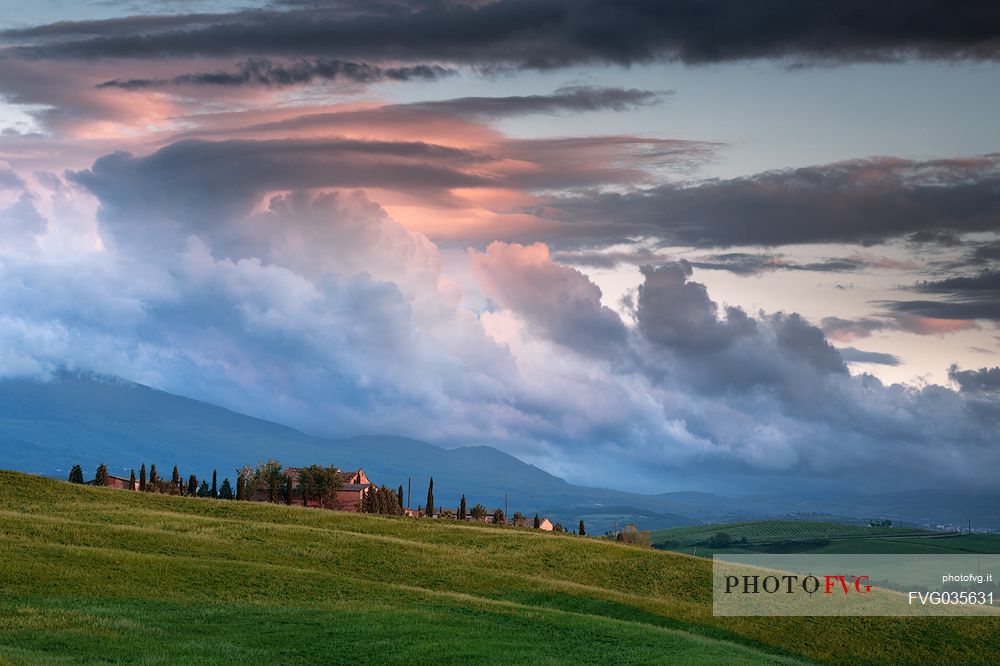 The beauty of the hills in Val d'Orcia, ridges and farmhouses typical of Tuscan beauties, Orcia valley, Tuscany, Italy, Europe