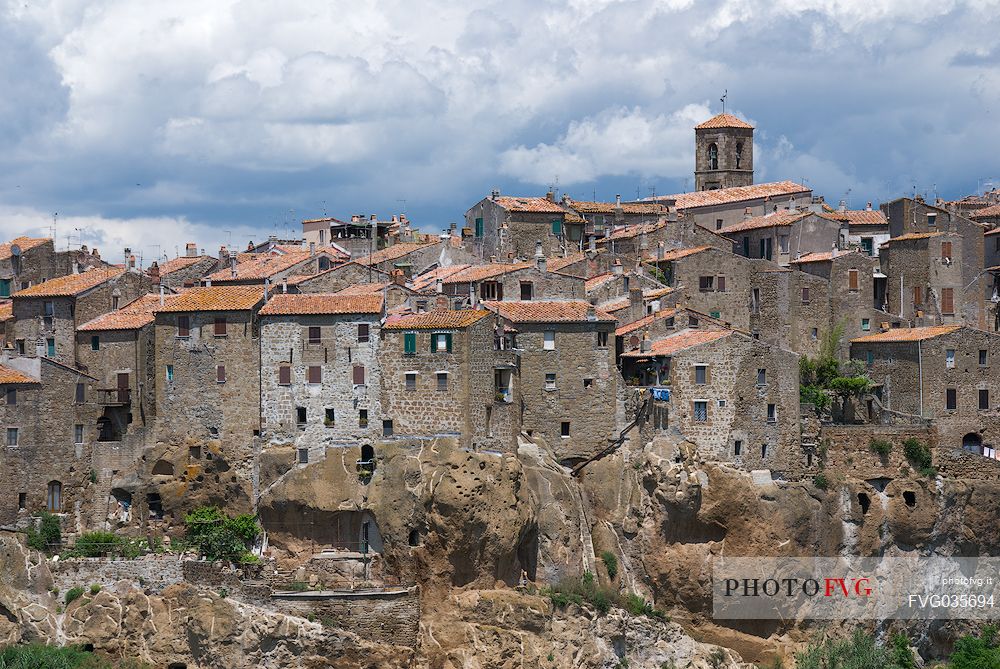 Pitigliano village, the cliff of Pitigliano is surrounded on three sides by many ravines, full of caves dug into the tuff, Maremma, Tuscany, Italy, Europe