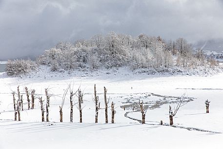 Frozen lake of Campotosto in the Gran Sasso and Monti della Laga national park, Abruzzo, Italy Frozen lake of Campotosto in the Gran Sasso and Monti della Laga national park, Abruzzo, Italy