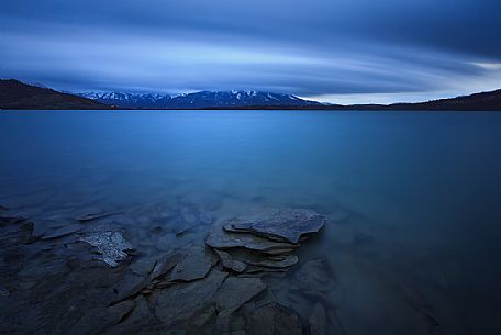 Campotosto lake at the blue hour, Gran Sasso e Monti della Laga national park, Abruzzo, Italy