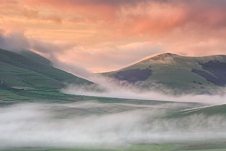 Foggy day wraps the Pian Grande of Castelluccio di Norcia, Sibillini national park, Umbria, Italy, Europe