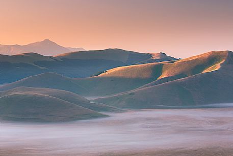 The fog on the plain of Castelluccio di Norcia, Sibillini National Park, Umbria, Italy, Europe