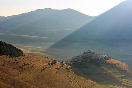 The old village of Castelluccio di Norcia before the disastrous earthquake of 2016 and  in the background the fields planted with lentil, Sibillini National park, Umbria, Italy, Europe