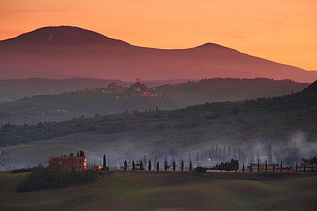 The beauty of the hills in Val d'Orcia, ridges and farmhouses typical of Tuscan beauties, Tuscany, Italy, Europe