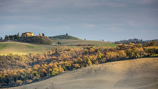 The beauty of the hills in Val d'Orcia, ridges and farmhouses typical of Tuscan beauties, Pienza, Orcia valley, Tuscany, Italy, Europe