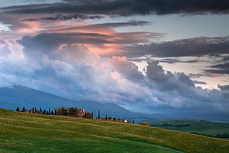 The beauty of the hills in Val d'Orcia, ridges and farmhouses typical of Tuscan beauties, Orcia valley, Tuscany, Italy, Europe