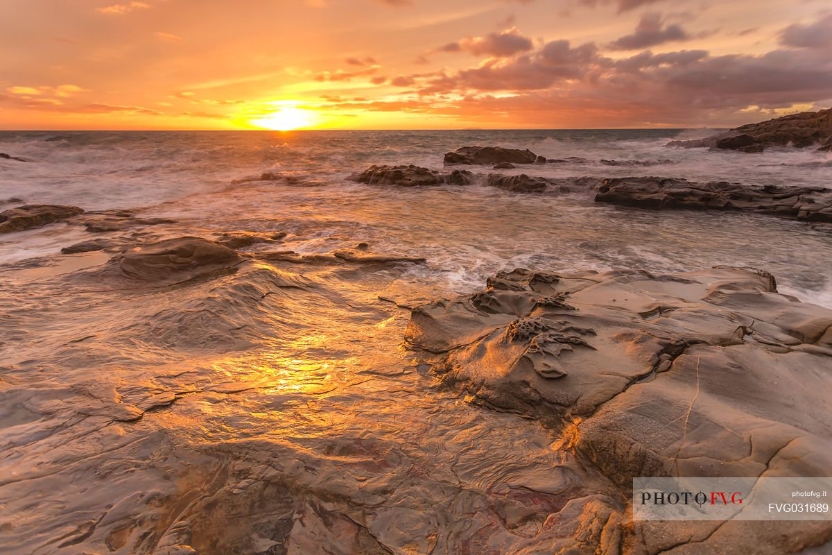 Sea rocks at sunset, Calafuria, Livorno, Tuscany, Italy