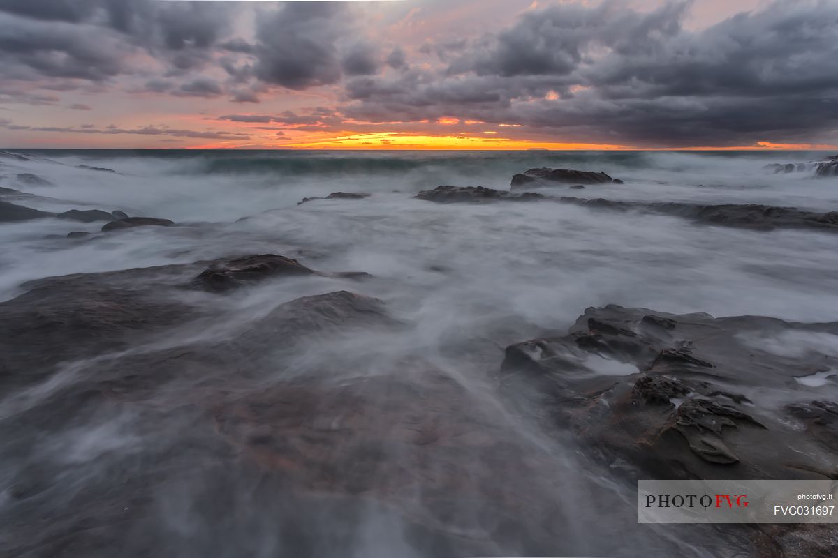 Sea rocks at twilight, Calafuria, Livorno,Tuscany, Italy