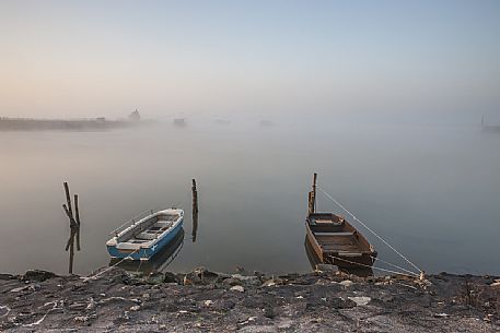 Rowing Boats in the coast of Comacchio lagoon, Emilia Romagna, Italy