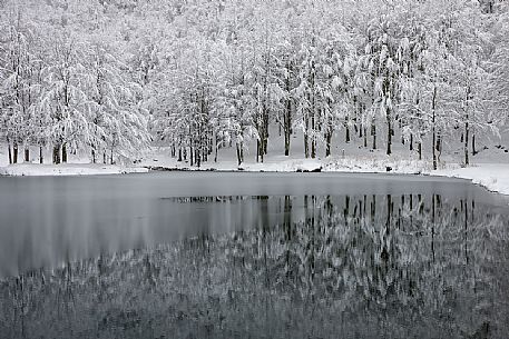 Ice and snow at the Cavone lake, Apennines, Emiia Romagna, Italy
