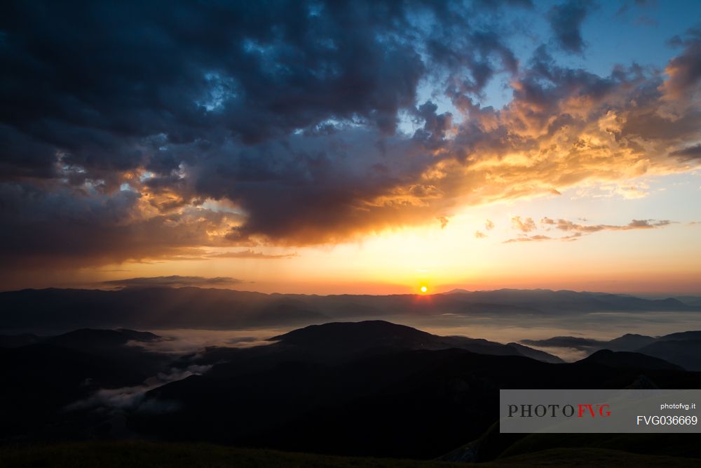 Sunrise on the expanse of mountains, Apuane Alps, Penna di Sumbra mount, Tuscany, Italy, Europe