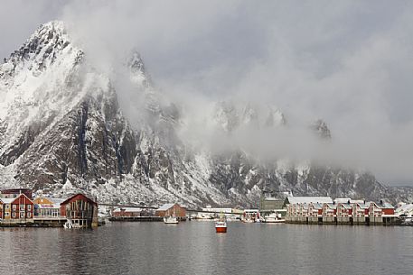Fishing boat come back to the harbour of Svolvaer village, Lofoten island, Norway, Europe Fishing boat come back to the harbour of Svolvaer village, Lofoten island, Norway, Europe