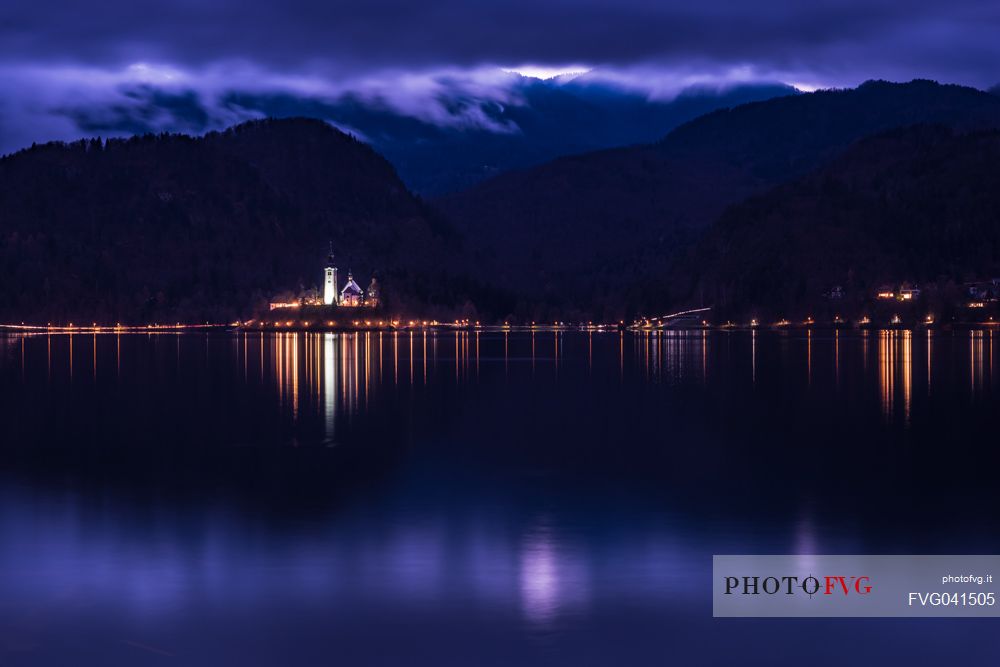 Bled lake with the church of Assumption, Marijino vnebovzetje, on the islet by night, Slovenia, Europe