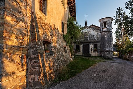 Ancient fortified village of Villafredda decorated by the colors of the sunset, Tarcento, Friuli Venezia Giulia, Italy