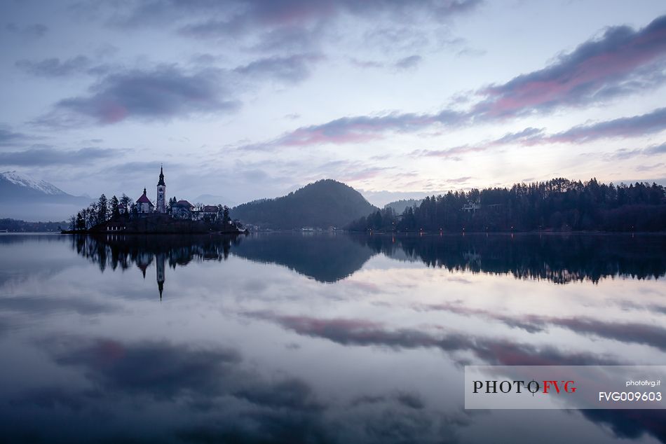 A very cold sunrise of December on the banks of Bled lake, looking at the only real island of whole Slovenia.
