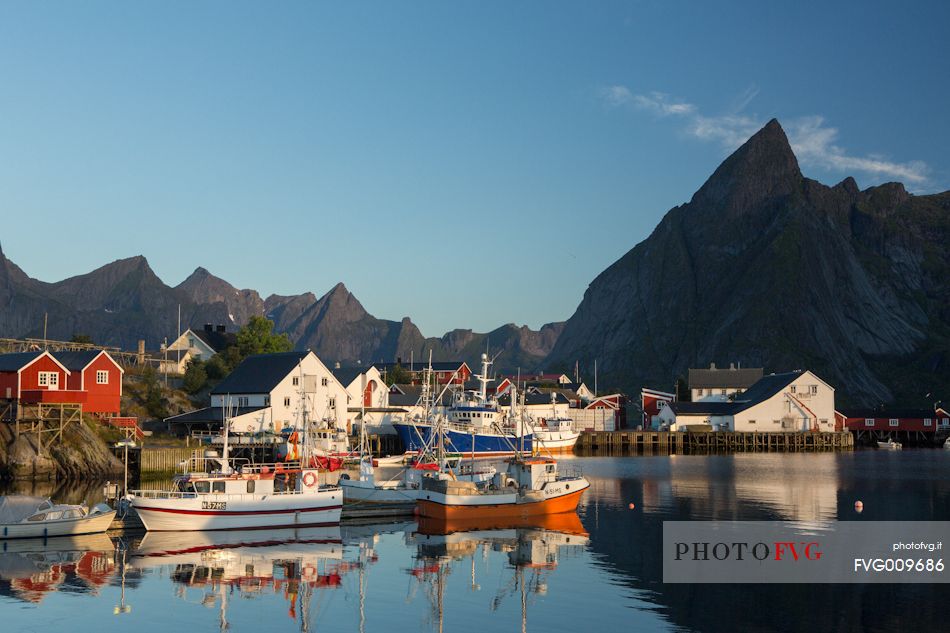 The Lofoten Mountains overlooking the harbor Hamnoya