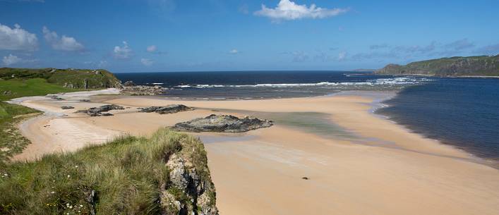 The white beaches of Doagh peninsula in the far north of Ireland