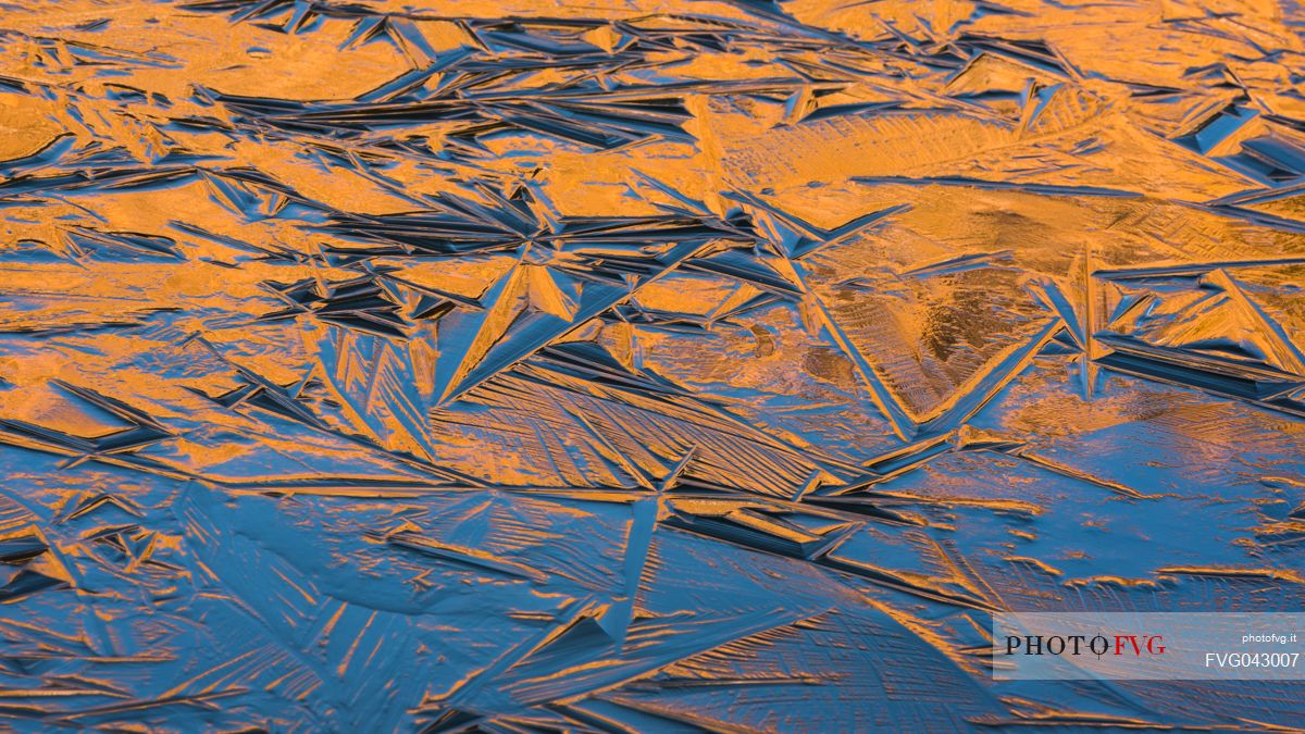 Details of the newly formed ice on Lake Calaita, Paneveggio and Pale di San Martino natural park, dolomites, Trentino, Italy, Europe