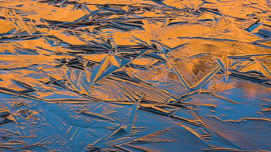 Details of the newly formed ice on Lake Calaita, Paneveggio and Pale di San Martino natural park, dolomites, Trentino, Italy, Europe