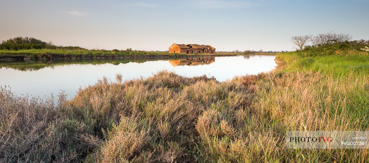 An old house for fishing anguilla on the Comacchio's lagoon at the dusk