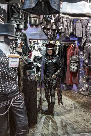 Young girl inside one punk-shop in the borough of Camden Town Young girl inside one punk-shop in the borough of Camden Town