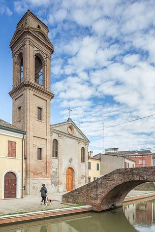 Morning view of Chiesa del Carmine with woman and dog