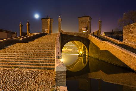 Night view of Tre Ponti bridge in the moonlight