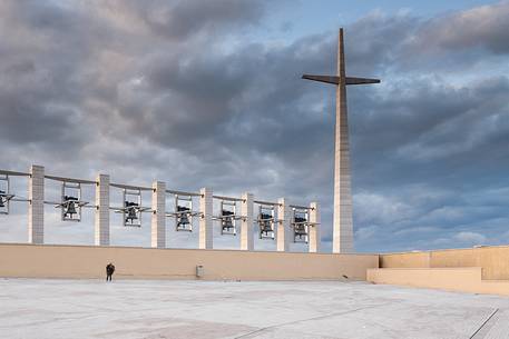 Pilgrim walk on the square in front of Padre Pio's church at the sunrise